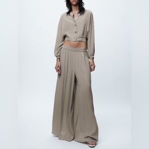 Zara wide flowy pants in pearl gray. Never worn / new with tags. Size M
